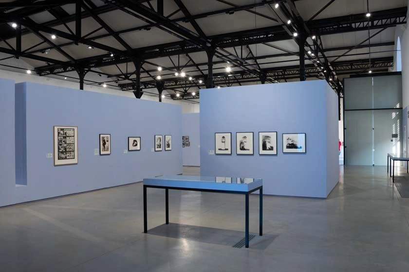 The picture shows part of the Feminist Avant-Garde exhibition in Arles. The exhibition areas are in shades of blue and purple, which create a nice contrast to the works of art, which are mostly in black and white. s a part of the Feminist Avant-garde exhibition in Arles. The exhibition areas are in shades of blue and purple, which create a nice contrast to the artworks, which are mostly in black and white.